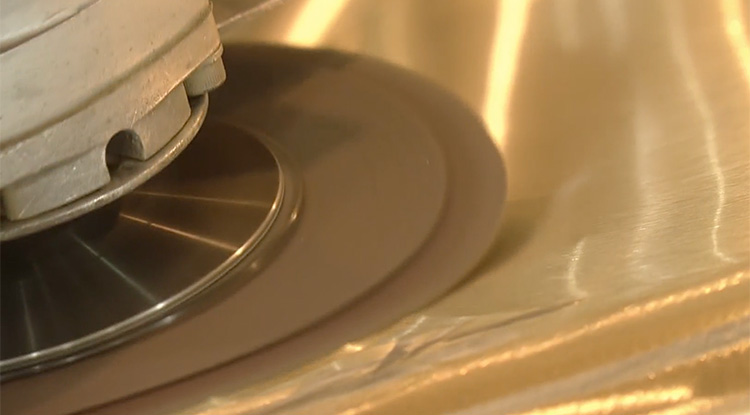 The surface of the propeller is fine-tuned to the nearest 1/100th of a millimeter by hand by technician.
