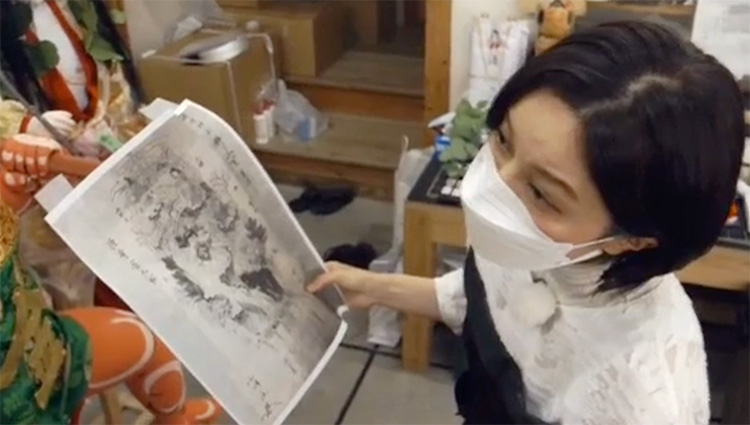 Check the design drawing and the actual doll.
